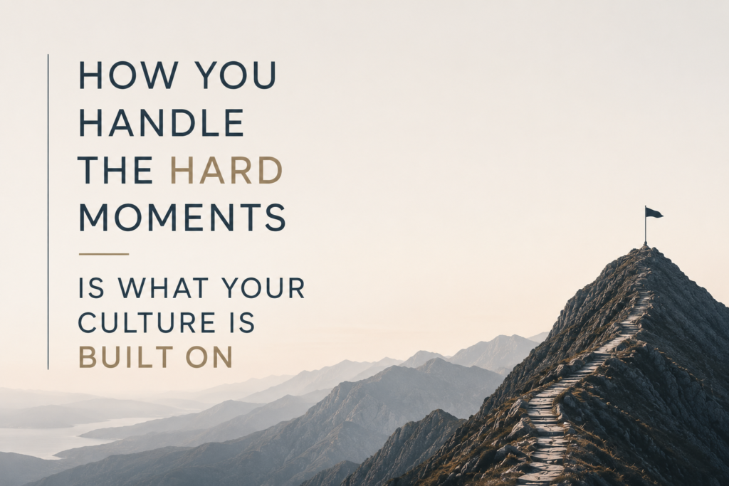 Quote graphic over a mountain summit image reading: How you handle the hard moments is what your culture is built on.